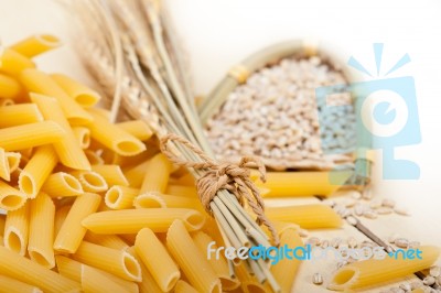 Italian Pasta Penne With Wheat Stock Photo