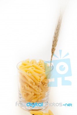 Italian Pasta Penne With Wheat Stock Photo