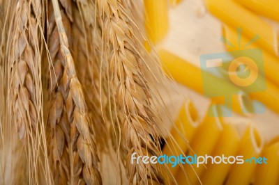 Italian Pasta Penne With Wheat Stock Photo