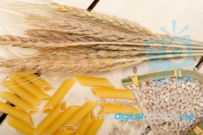 Italian Pasta Penne With Wheat Stock Photo