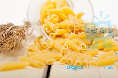 Italian Pasta Penne With Wheat Stock Photo