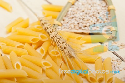 Italian Pasta Penne With Wheat Stock Photo