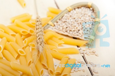 Italian Pasta Penne With Wheat Stock Photo