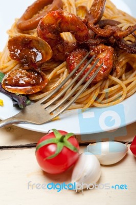 Italian Seafood Spaghetti Pasta On Red Tomato Sauce Stock Photo