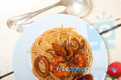 Italian Seafood Spaghetti Pasta On Red Tomato Sauce Stock Photo