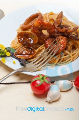 Italian Seafood Spaghetti Pasta On Red Tomato Sauce Stock Photo