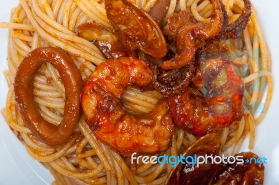 Italian Seafood Spaghetti Pasta On Red Tomato Sauce Stock Photo