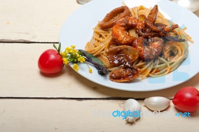 Italian Seafood Spaghetti Pasta On Red Tomato Sauce Stock Photo