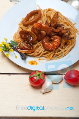 Italian Seafood Spaghetti Pasta On Red Tomato Sauce Stock Photo