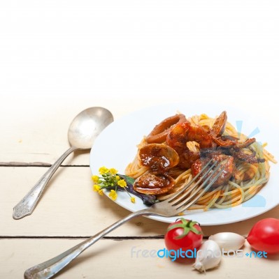 Italian Seafood Spaghetti Pasta On Red Tomato Sauce Stock Photo