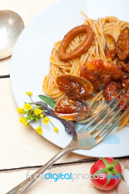 Italian Seafood Spaghetti Pasta On Red Tomato Sauce Stock Photo