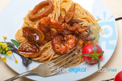 Italian Seafood Spaghetti Pasta On Red Tomato Sauce Stock Photo