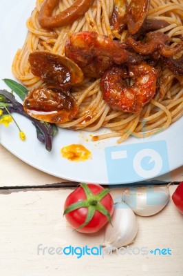 Italian Seafood Spaghetti Pasta On Red Tomato Sauce Stock Photo