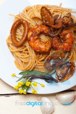 Italian Seafood Spaghetti Pasta On Red Tomato Sauce Stock Photo