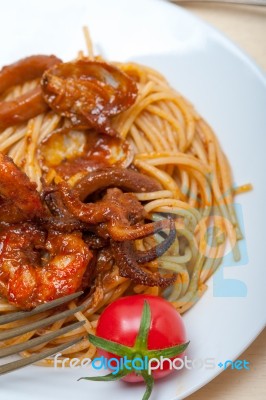 Italian Seafood Spaghetti Pasta On Red Tomato Sauce Stock Photo