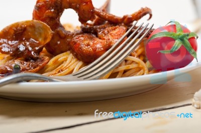 Italian Seafood Spaghetti Pasta On Red Tomato Sauce Stock Photo