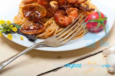 Italian Seafood Spaghetti Pasta On Red Tomato Sauce Stock Photo