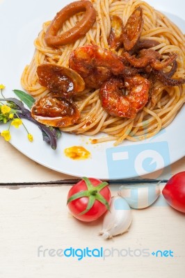 Italian Seafood Spaghetti Pasta On Red Tomato Sauce Stock Photo