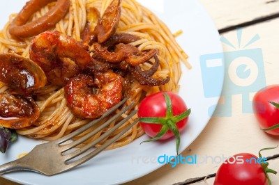 Italian Seafood Spaghetti Pasta On Red Tomato Sauce Stock Photo