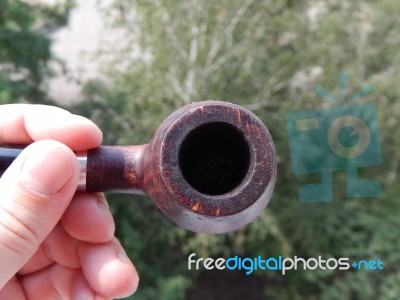 Items For Smoking Pipes And Cigarettes, Lighters, Matches  Stock Photo