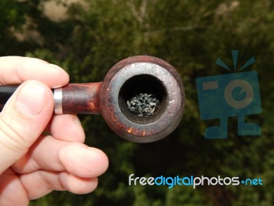 Items For Smoking Pipes And Cigarettes, Lighters, Matches  Stock Photo