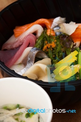 Japanese Food Tekka Don Take Away On Wooden Background Stock Photo