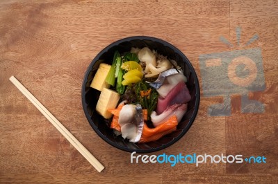 Japanese Food Tekka Don Take Away On Wooden Background Stock Photo