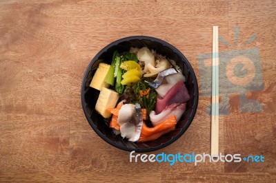 Japanese Food Tekka Don Take Away On Wooden Background Stock Photo