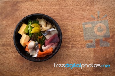 Japanese Food Tekka Don Take Away On Wooden Background Stock Photo