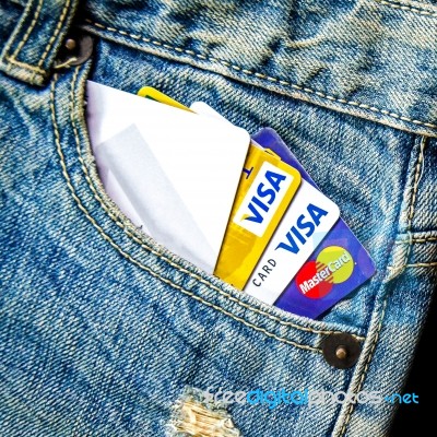 Jeans Lack And And Credit Card On The Wooden Floor Stock Photo