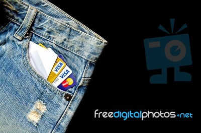 Jeans Lack And And Credit Card On The Wooden Floor Stock Photo