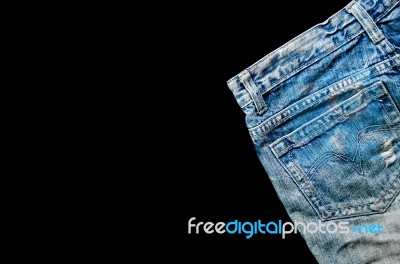 Jeans Lack On The Black Background For Isolate Stock Photo