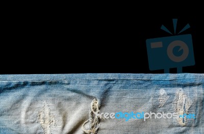 Jeans Lack On The Black Background For Isolate Stock Photo