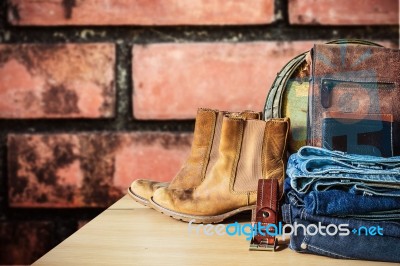 Jeans On A Wooden Table Stock Photo