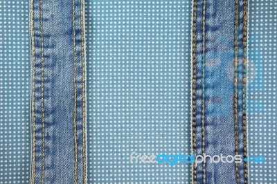 Jeans With Stitch On Blue Dot Cloth Stock Photo