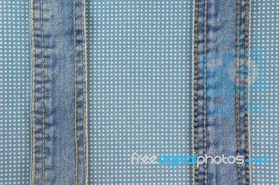 Jeans With Stitch On Blue Dot Cloth Stock Photo