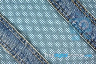 Jeans With Stitch On Blue Dot Cloth Background Stock Photo