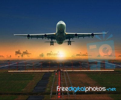 Jet Plane Taking Off From Airport Runway For Traveling And Logistic Theme Stock Photo