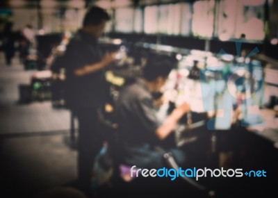 Jewelry Factory With Blurred Workers Background Stock Photo