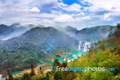 Jiulong Waterfall At Sunset In Luoping, China Stock Photo