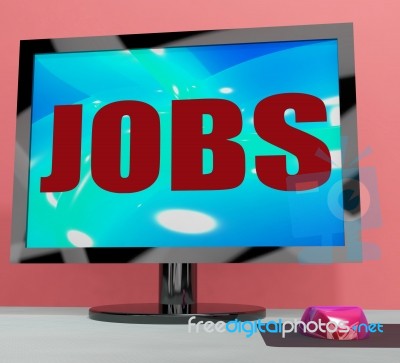 Jobs On Monitor Shows Employment Or Hiring Online Stock Image