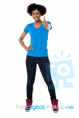 Joyous Young Woman Gesturing Success Stock Photo