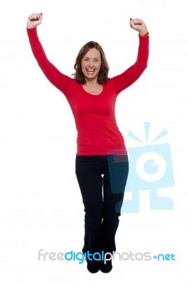 Jubilant Lady Celebrating Her Success Stock Photo