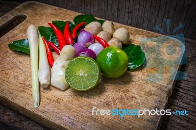 Kaffir Lime Leaf, Lemon, Lemongrass, Galangal, Chili, Onions And Spicy Ingredients Thai Food Stock Photo