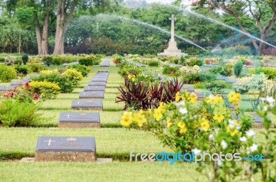 Kanchanburi, Thailand - May 3, 2014: Chungkai War Cemetery This Is Historical Monuments Where To Respect Prisoners Of The World War 2 Rest In Peace Here In Kanchanaburi Province, Thailand Stock Photo