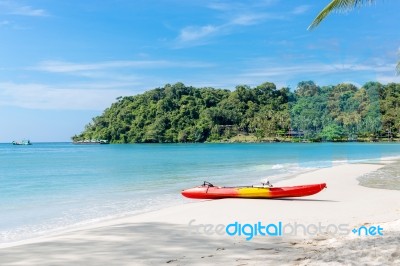 Kayaks On The Tropical Beach With Beautiful Sky Stock Photo