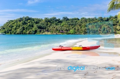 Kayaks On The Tropical Beach With Beautiful Sky Stock Photo