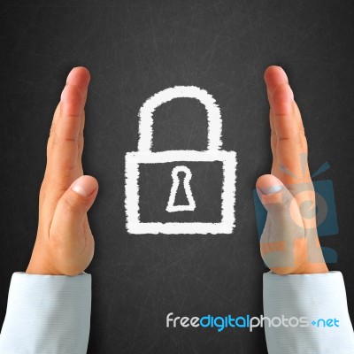 Key And Locker On Blackboard Stock Image