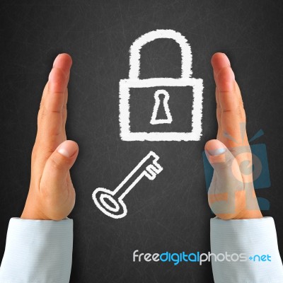 Key And Locker On Blackboard Stock Image