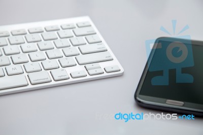 Keyboard And Smart Phone Stock Photo